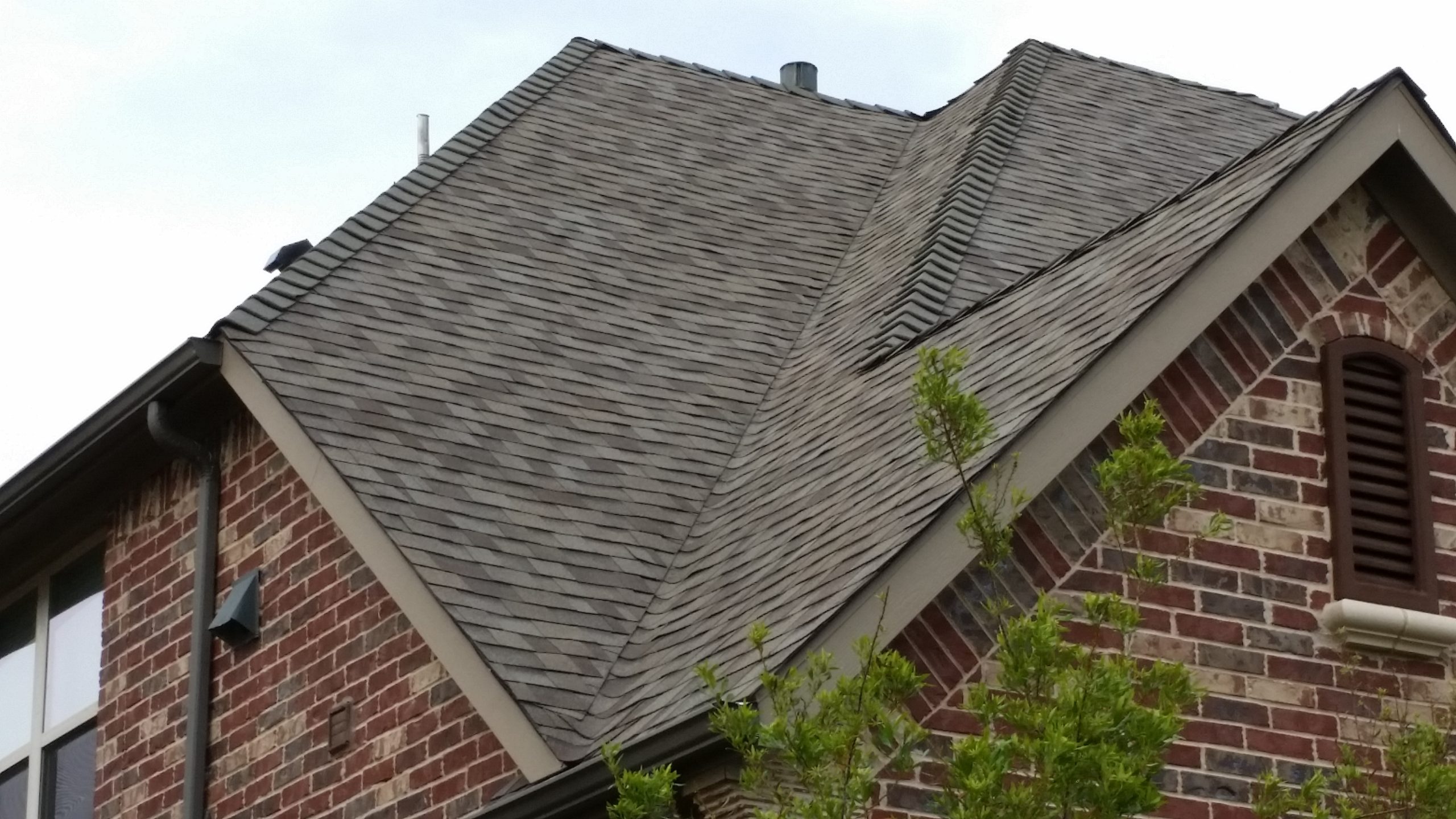 a newly renovated and refurbished residential roof